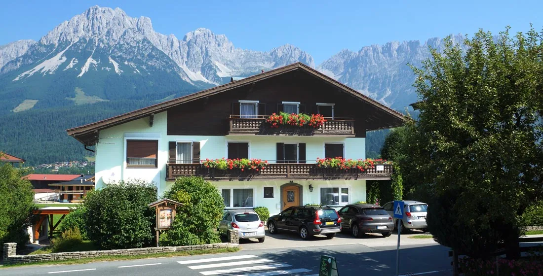 Haus Bichler in summer in front of the Wilder Kaiser